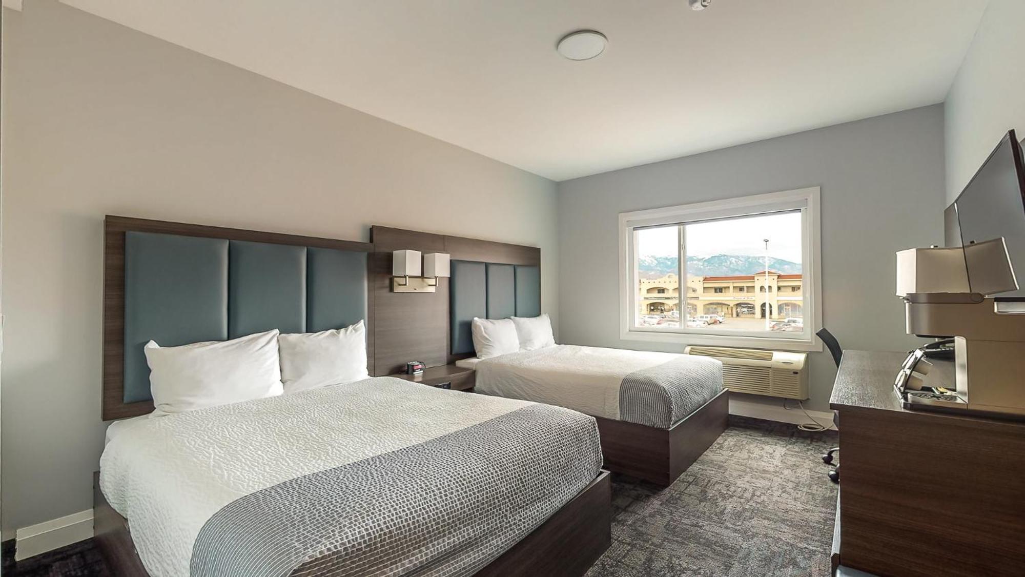Quadruple Room with Two Queen Beds and Mountain View - Non Smoking/Interior Corridor