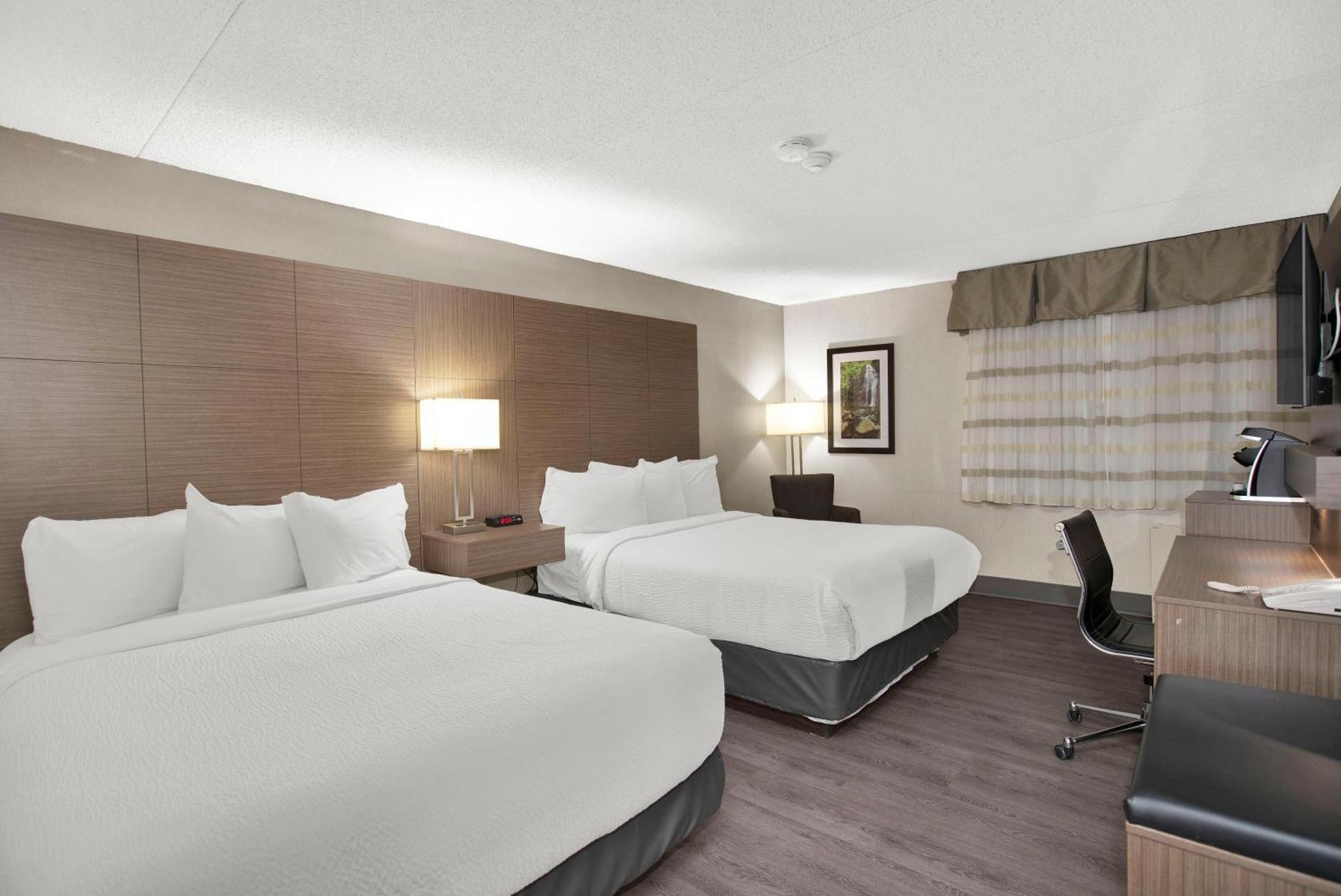 Queen Room with Two Queen Beds and Pool View