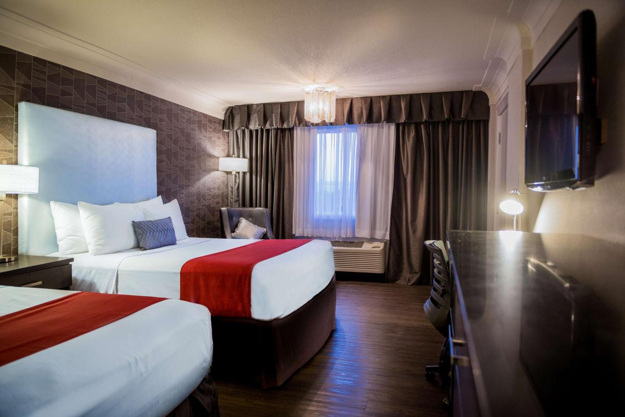 Queen Room Two Queen Beds Shower Only Atrium or Non-Smoking,1328630834:JPEG